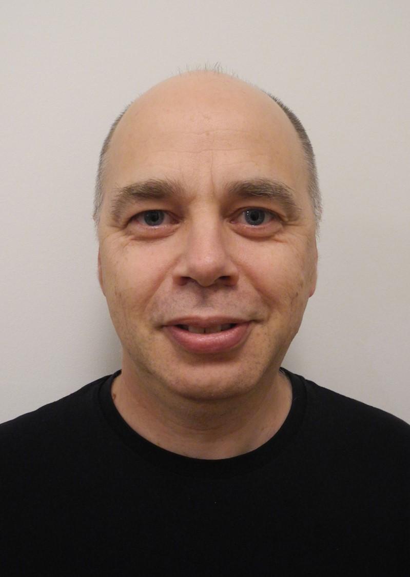 Wilhelm Gerner, T-cell Biology group leader, Pirbright Dr Wilhelm Gerner, head and shoulders image, smiling and waering a black round neck t-shirt